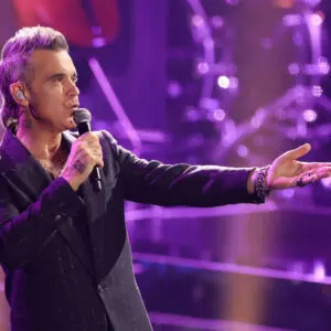 The Rise and Impact of Robbie Williams in Modern Pop Music