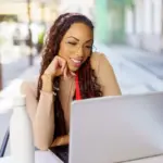 A woman working on her laptop during a movie went viral